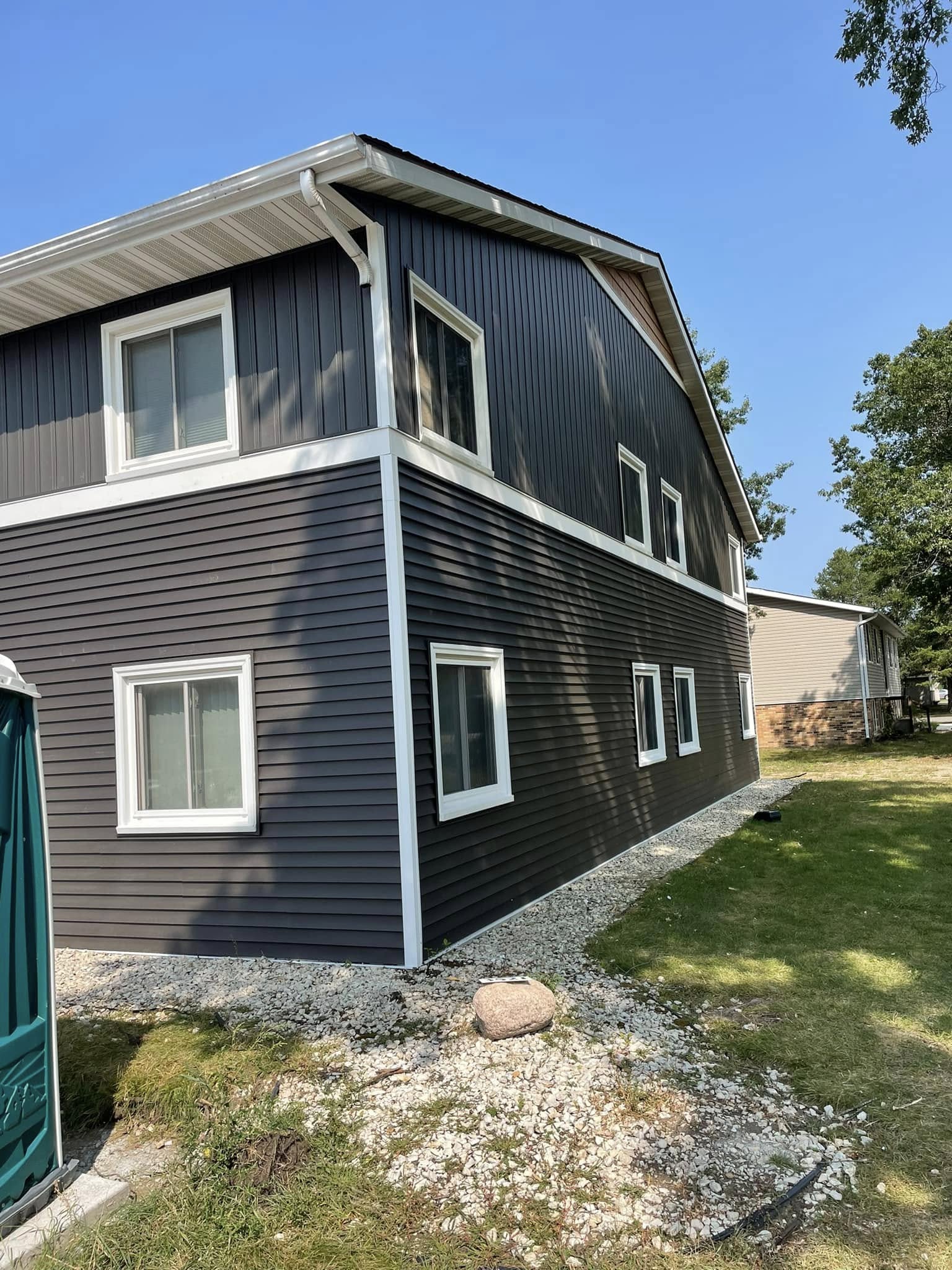 siding on a large residential home